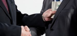 В Ташкенте и Джизаке задержаны помощники хокимов по подозрению в коррупции